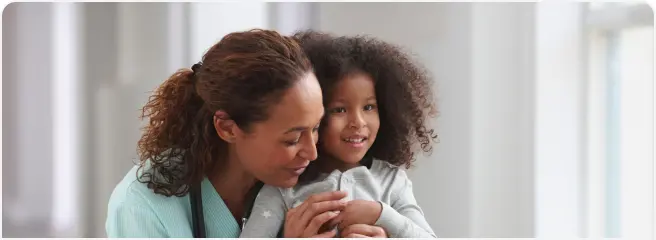 Happy doctor and child